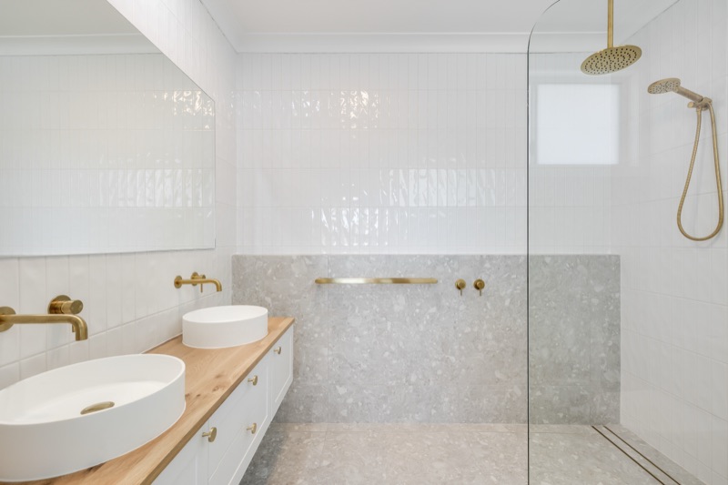 Ensuite with double vanity and frameless shower