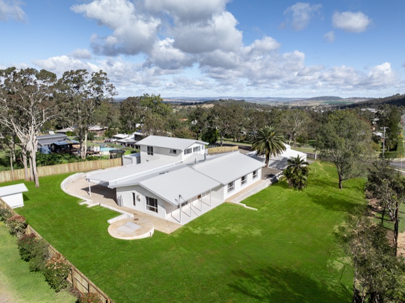 Aerial view of the renovated home and shed