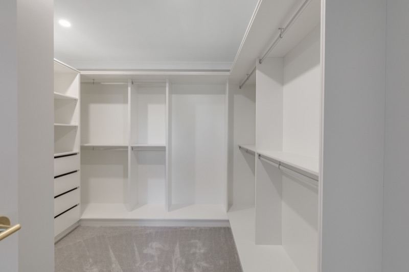 Walk-in robe with built-in shelving