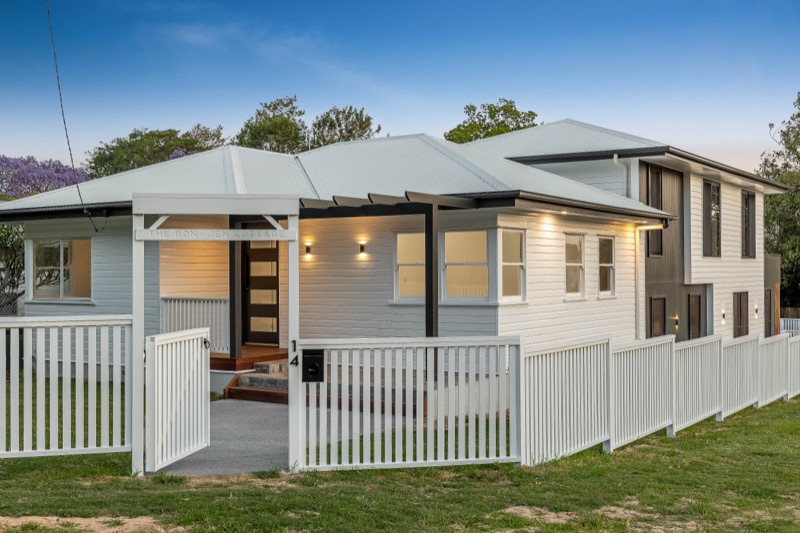 Renovated weatherboard front at dusk