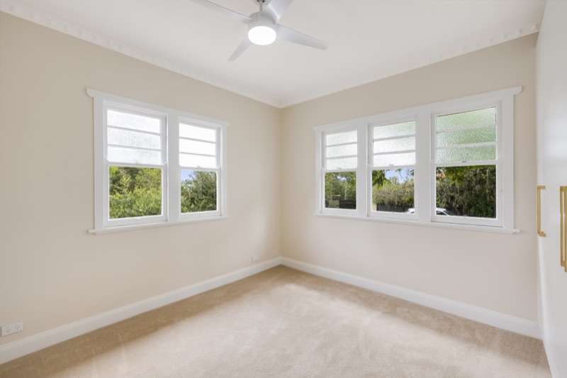 Bedroom with original casement windows