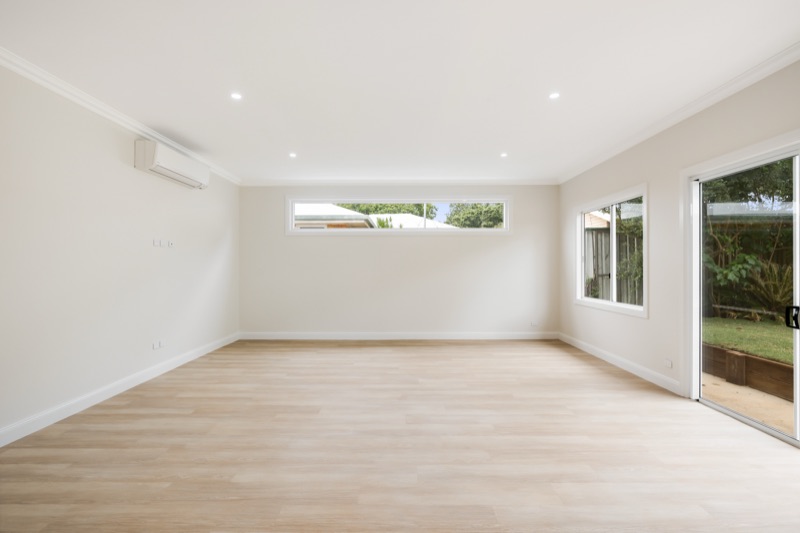 Living area with sliding doors to the yard
